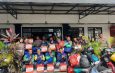 HUT Bhayangkara ke-80, Ditlantas Polda Lampung Bagikan 1000 Paket Sembako, Ojol Dibekali Safety Riding